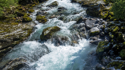 Fototapeta premium Rapid mountain river / Rapid mountain river. River running over the rocks 