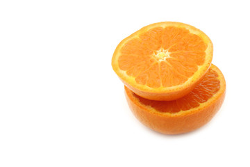 fresh tangerine halves on a white background
