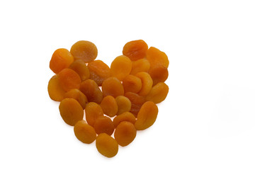 Apricot heart on white background