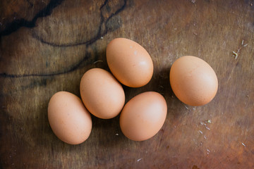 Eggs on wooden background