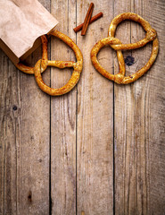 Homemade pastries. Pretzel on wooden background. Food