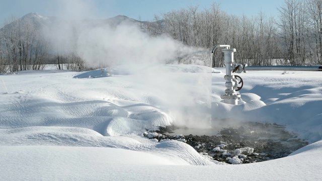 Chink with hot water and snow in Kamchatka