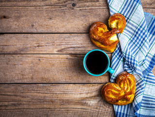 Delicious pastries for Breakfast with kitchen towel, coffee. Mor