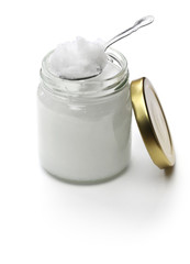 coconut oil in jar isolated on white background
