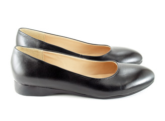 pair of black women shoes (low-heeled) on white background
