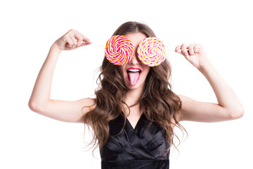 Funny girl with tongue and candy.