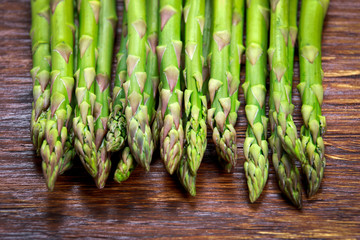 Fresh  asparagus on wooden table. view from top