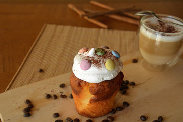 Delicious Homemade Muffin With Coffee Cup On A Table.