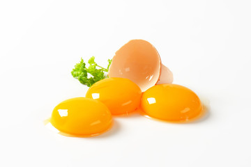 Raw egg yolks - obrazy, fototapety, plakaty