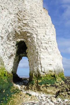Rock arch in chalk cliffs at Kingsgate Bay, Kent, UK