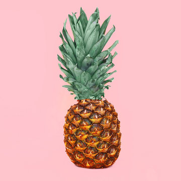 Pineapple fruit on colorful pink background, ananas photo