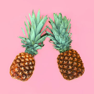 Two pineapple on pink background, ananas photo