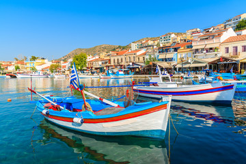 Fototapeta na wymiar Typical colorful Greek fishing boats in Pythagorion port on Samos island, Greece