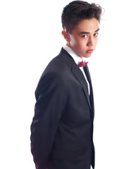 teenage boy wearing a suit