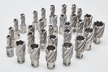 A bunch of heavy duty drill bits on studio white. HSS core drill for metal.