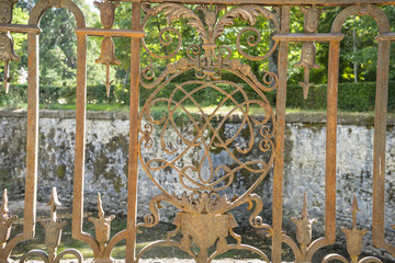 iron gate in an old nineteenth century style garden in Spain