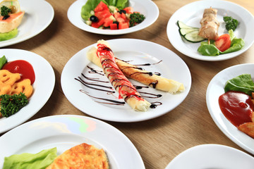 a host of delicious dishes on the table in the children's  restaurant