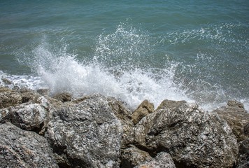 Waves crashing off coastal rocks in the south of Spain