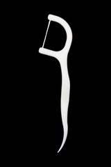 One dental floss stick isolated on white