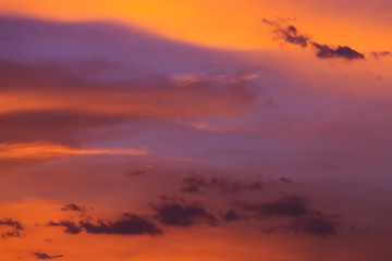 colorful dramatic sunset sky with orange cloud, twilight sky