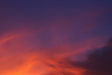 colorful dramatic sunset sky with orange cloud, twilight sky