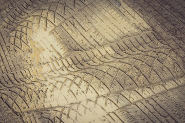 wheel trace off road on muddy soil