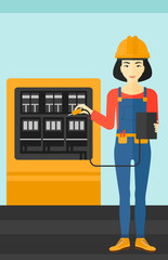 Electrician with electrical equipment.