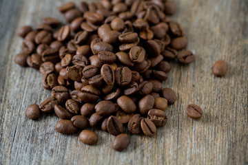 coffee beans on wooden surface