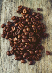 coffee beans on wooden surface