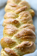 Fresh braided bread with sesame seeds