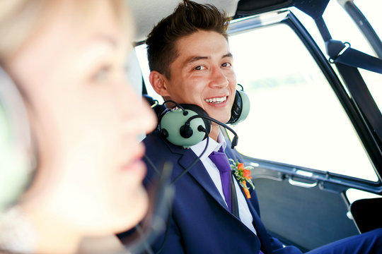 Groom inside a helicopter