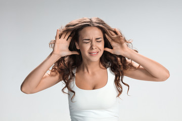 Fototapeta premium Portrait of young woman with shocked facial expression