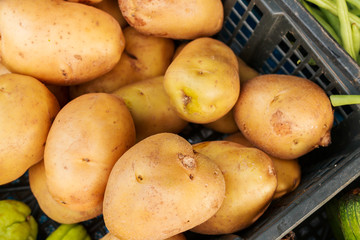 potatoes raw vegetables food in market