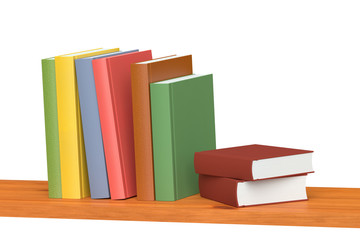 Colored books on wooden bookshelf
