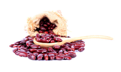 red beans  in the bag and spoon on the white background