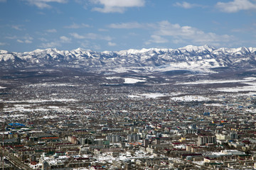 Town in the valley at the mountain range