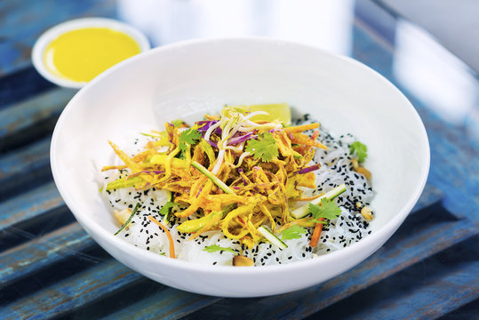 curry sauce vegetable salad with noodles and sesame