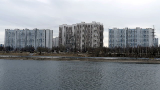 Town Houses on the Background of the River