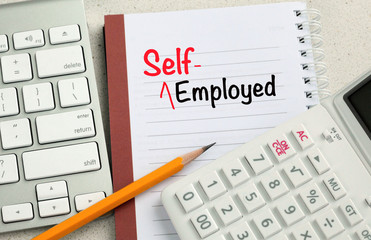 concept of self-employed with desk background