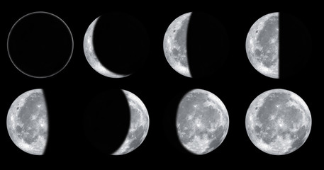 Set of different moon phases isolated on black background