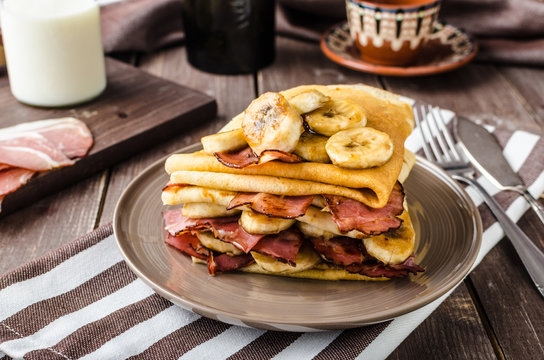 Pancakes with bacon, banana and maple sirup