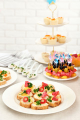 Set of cold snacks and canape, closeup