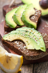 toast with slices of avocado and spices