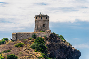 Fototapeta na wymiar Ancient San Elfisio tower, Sardinia, near ruined ancient Nora city, Pula, Sardegna, Italy.