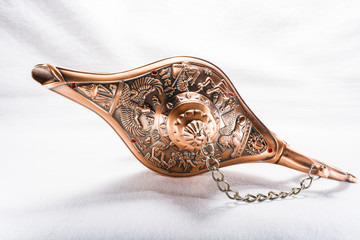 Aladdin's lamp isolated on white background 