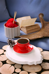 Cup of hot drink in living room. Comfortable winter weekend or holidays at home