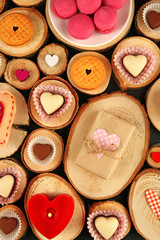Valentine's Day concept. Different  hearts on wooden stumps background