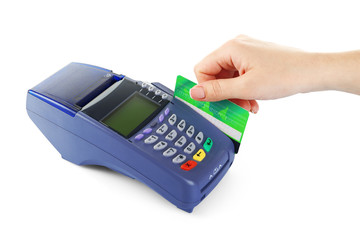 Female hand with credit card and bank terminal, isolated on white