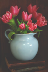 Bouquet of pink tulips in a vase, close up