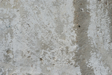 Wall fragment with attritions and cracks